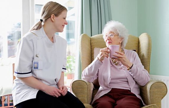 Nurse with elderly woman